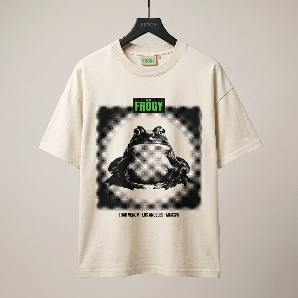 Frögy Toad Venom Halftone Tee in Bone, front — slime-green FRÖGY box logo above halftone toad panel