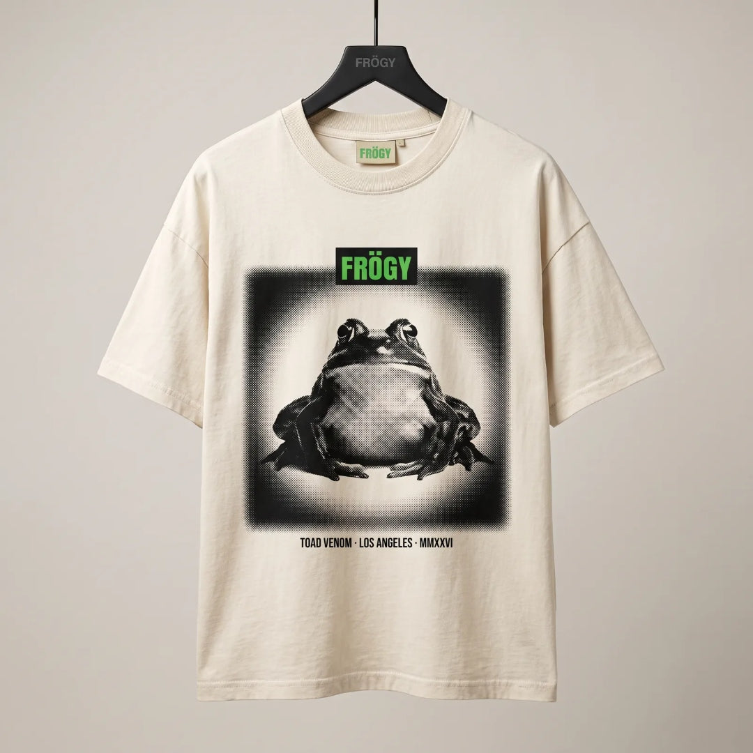 Frögy Toad Venom Halftone Tee in Bone, front — slime-green FRÖGY box logo above halftone toad panel