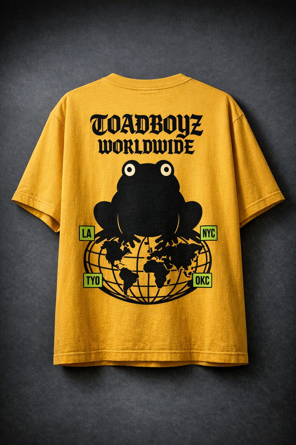 Toadboyz Worldwide Tee — back, mustard, globe with lane tags LA NYC TYO OKC